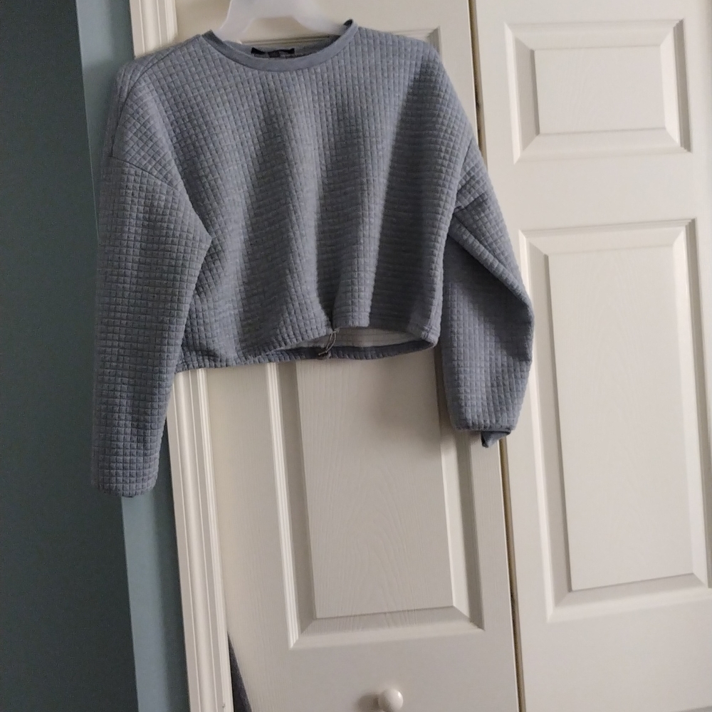 A gray crop top by faded rose